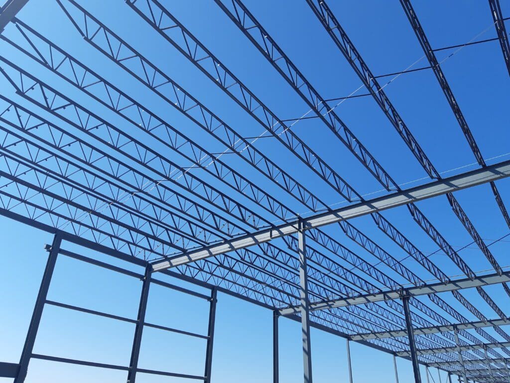 The blue sky above the building frames