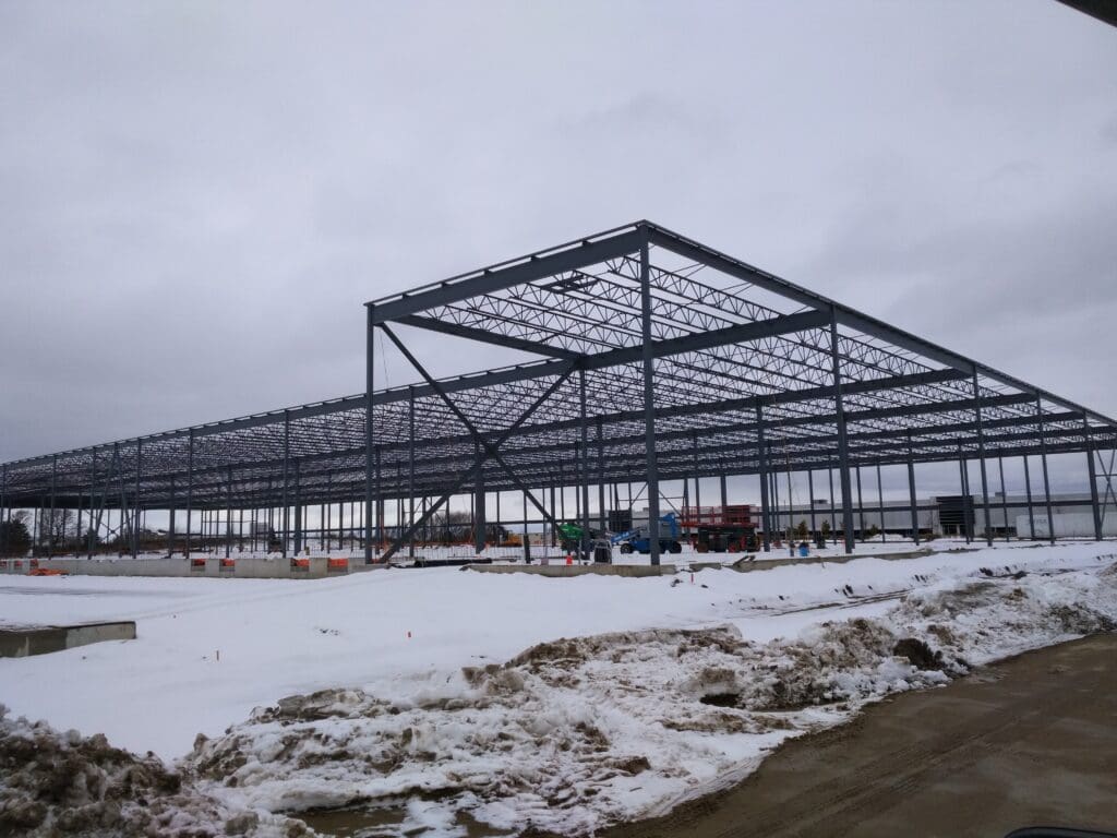 Snow covering the construction site’s ground