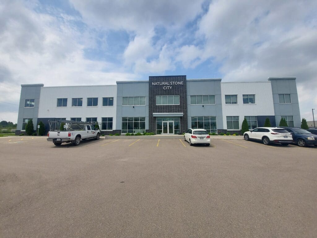 Cars parked outside a new building  