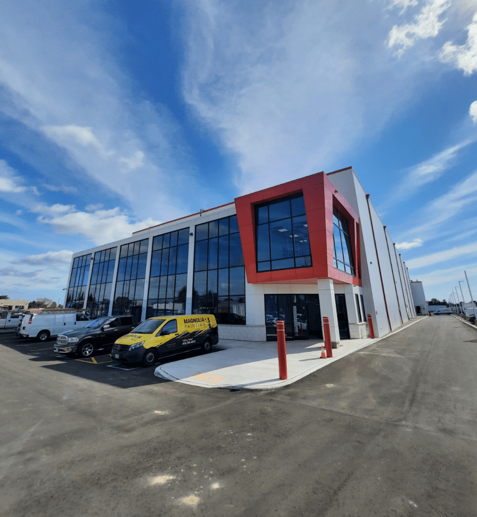 A building with parked cars outside